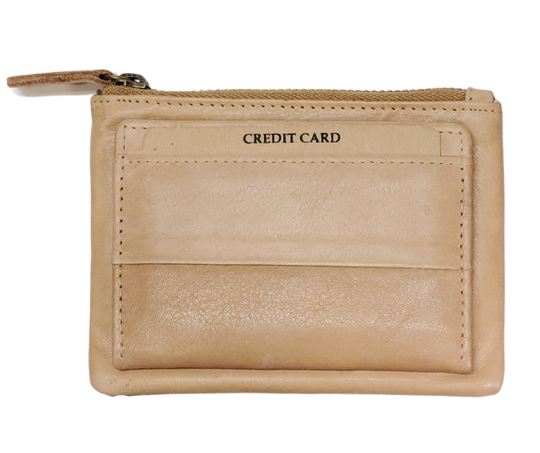 Looking to simplify your life? The "Carter" Coin Pouch Wallet might be just the ticket. It has just the right number of card slots, an ID slot, and a zippered pouch for your little extras and coins. The size is perfect for front pockets, and it even has RFID security. Come visit our shop in Smyrna, TN and put your minimalist skills to the test!