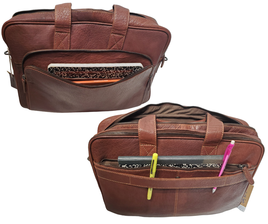 The Colonel Leather Laptop Bag is a no-frills bag that's perfect for the daily hustle. Crafted from buttery soft pebble grain leather, it only gets better with age. With a spacious main pocket, computer sleeve, and room for paperwork and snacks, it's got your weekday needs covered. Power cords? No problem! Just stash them in one of the two outside zippered pockets. And for ultimate convenience, it comes with an adjustable shoulder strap. Swing by our Smyrna, TN shop and snag one today!