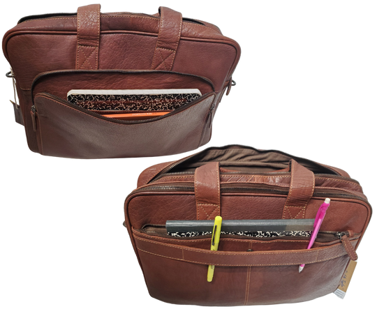 The Colonel Leather Laptop Bag is a no-frills bag that's perfect for the daily hustle. Crafted from buttery soft pebble grain leather, it only gets better with age. With a spacious main pocket, computer sleeve, and room for paperwork and snacks, it's got your weekday needs covered. Power cords? No problem! Just stash them in one of the two outside zippered pockets. And for ultimate convenience, it comes with an adjustable shoulder strap. Swing by our Smyrna, TN shop and snag one today!