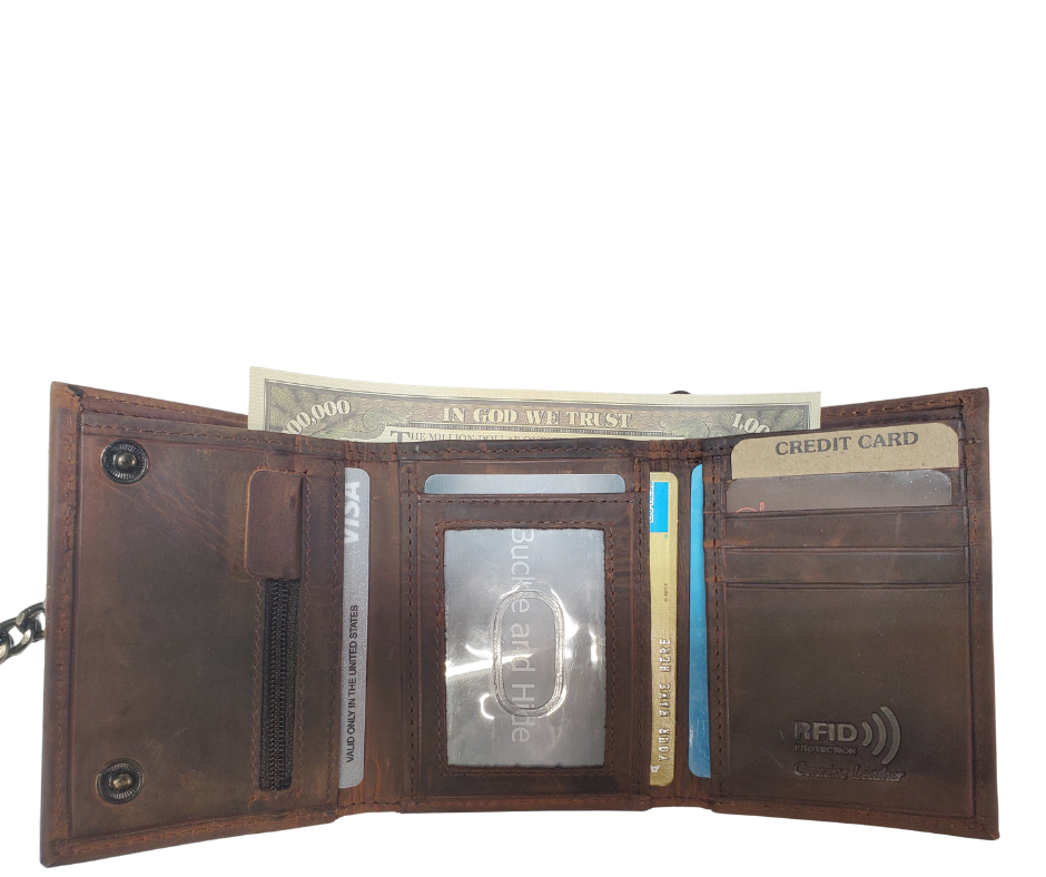 Inside view. Popular Distressed brown RFID Secure Tri-fold Chain Wallet. 2 cash slots, 4 card slots, I.D. slot, zippered pocket for all your stash. Will darken with a nice patina with use. It's imported but it's Buckle and Hide approved. Standard tri-fold size.
