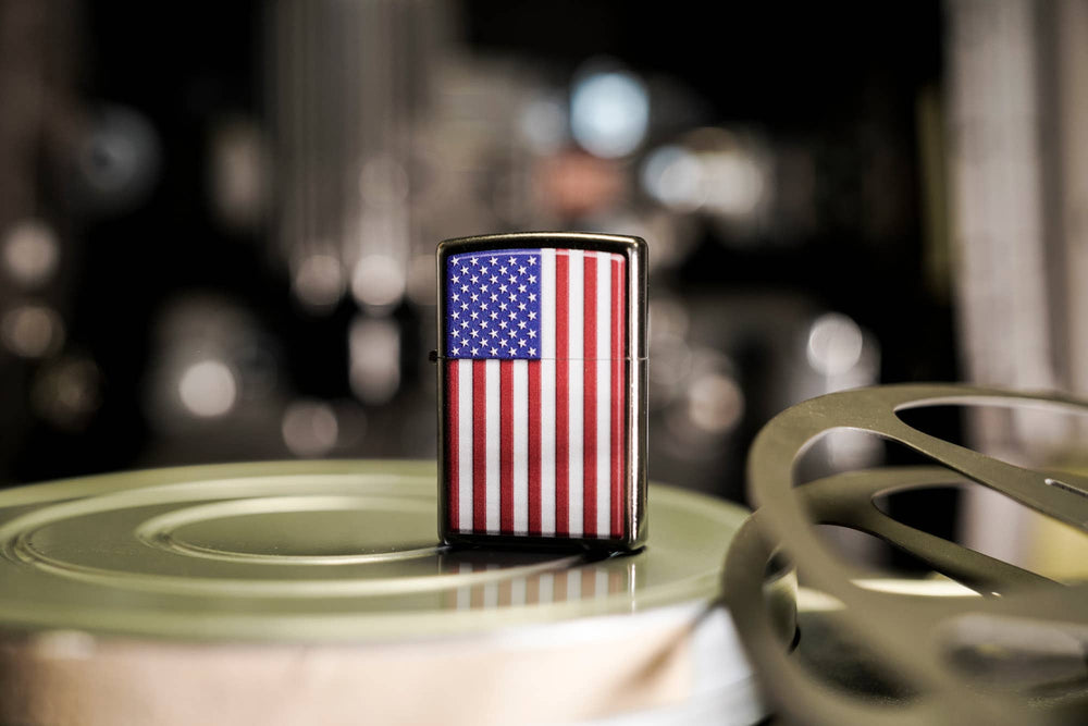 This Street Chrome™ windproof lighter featuring an American Flag was designed to be beautiful, brilliant, and work for you, guaranteed. All metal construction; windproof design works virtually anywhere. Refillable for a lifetime of use. Comes packaged in a gift box. Available in our Smyrna, TN shop.

Made in USA
Fuel: Zippo lighter fuel (sold separately)
Lighter Specs: Height: 2.25" Width: 0.5" Depth: 1.5" Weight: 2.0 oz
Lifetime guarantee that "it works or we fix it free™" Zippo contact info on gift box.