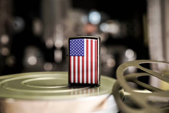 This Street Chrome™ windproof lighter featuring an American Flag was designed to be beautiful, brilliant, and work for you, guaranteed. All metal construction; windproof design works virtually anywhere. Refillable for a lifetime of use. Comes packaged in a gift box. Available in our Smyrna, TN shop.

Made in USA
Fuel: Zippo lighter fuel (sold separately)
Lighter Specs: Height: 2.25" Width: 0.5" Depth: 1.5" Weight: 2.0 oz
Lifetime guarantee that "it works or we fix it free™" Zippo contact info on gift box.