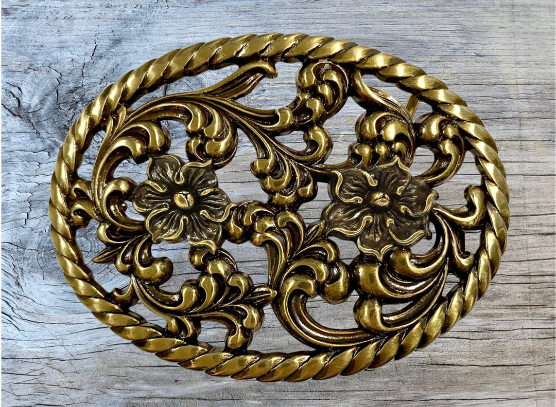Prairie Nights is a Filigreed Floral design in Brass that looks great on plain 1 1/2" Black or Brown belt. A easy to wear oval shape that&
