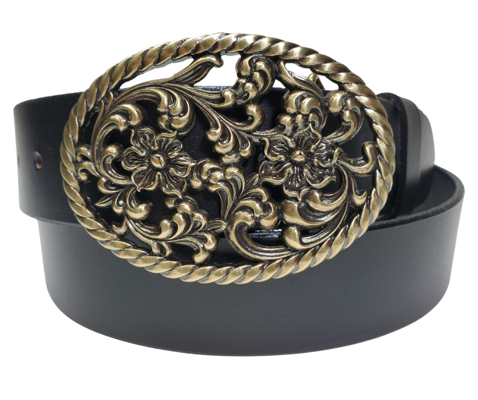 Our Prairie Nights shaped oval buckle has a rope edge, a Filigreed Floral center. It is Antiqued Silver or Brass colored, measures 2 3/4" tall by 3 3/4" wide and fits belts up to 1 1/2" wide. Buckle is made in Taiwan. Belt is a single strip of leather that is 1 1/2" wide and available in sizes 34" to 44". Colors are distressed brown or black. CHOOSE ONE BELT STRIP COLOR! It is available for purchase in our retail shop in Smyrna, TN, just outside Nashville and also in our online store.