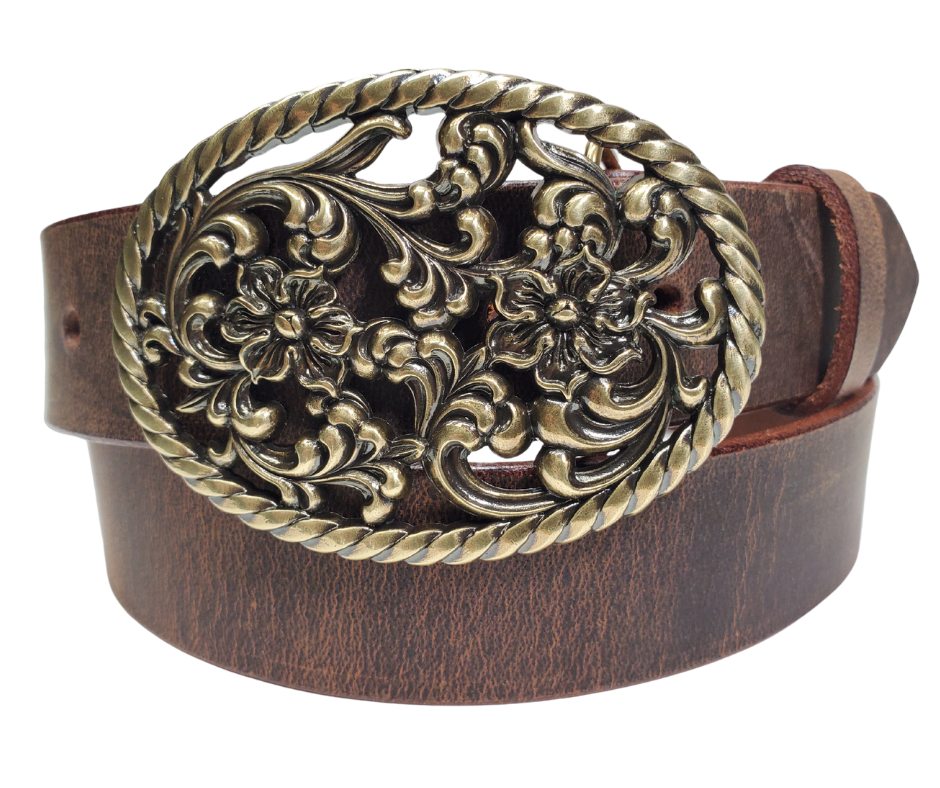 Our Prairie Nights shaped oval buckle has a rope edge, a Filigreed Floral center. It is Antiqued Silver or Brass colored, measures 2 3/4" tall by 3 3/4" wide and fits belts up to 1 1/2" wide. Buckle is made in Taiwan. Belt is a single strip of leather that is 1 1/2" wide and available in sizes 34" to 44". Colors are distressed brown or black. CHOOSE ONE BELT STRIP COLOR! It is available for purchase in our retail shop in Smyrna, TN, just outside Nashville and also in our online store.