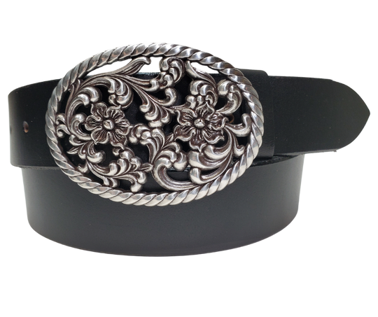 Our Prairie Nights shaped oval buckle has a rope edge, a Filigreed Floral center. It is Antiqued Silver or Brass colored, measures 2 3/4" tall by 3 3/4" wide and fits belts up to 1 1/2" wide. Buckle is made in Taiwan. Belt is a single strip of leather that is 1 1/2" wide and available in sizes 34" to 44". Colors are distressed brown or black. CHOOSE ONE BELT STRIP COLOR! It is available for purchase in our retail shop in Smyrna, TN, just outside Nashville and also in our online store.