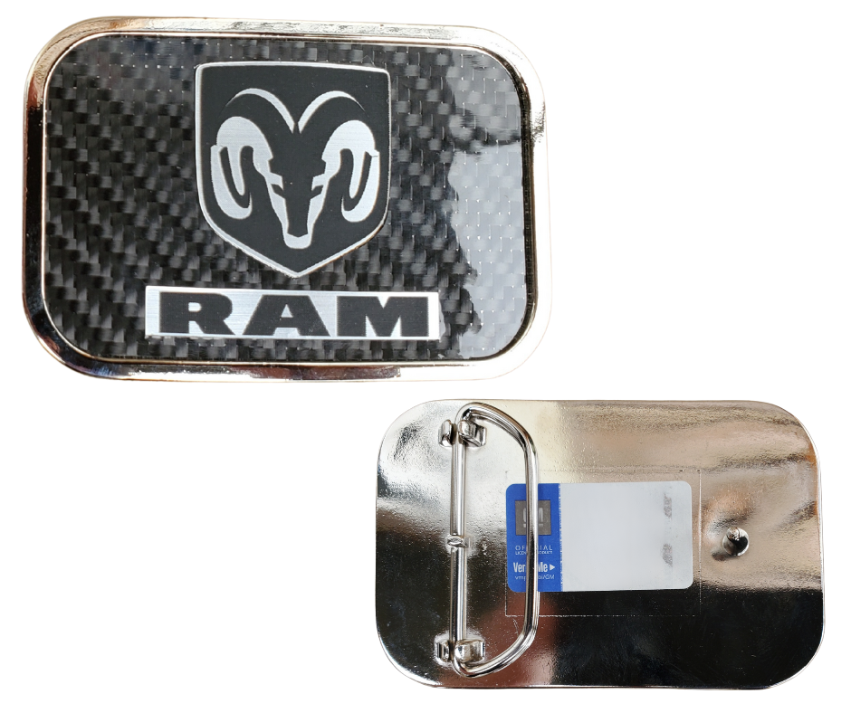 Officially licensed by RAM Motors. This Ram Logo Black Carbon Fiber Belt Buckle. Built with durable craftsmanship and a polished finish, perfect for Ram enthusiasts who want to wear their loyalty with western-inspired confidence. Made in the USA. You can find it in our shop conveniently located in Smyrna, TN, just outside of Nashville.

Features:
-Durable metal composition for long-lasting wear
-Measures 3.6 x 2.38 inches
-Fits a 1.5-inch wide belt
-USA made and officially licensed by Ram Motors