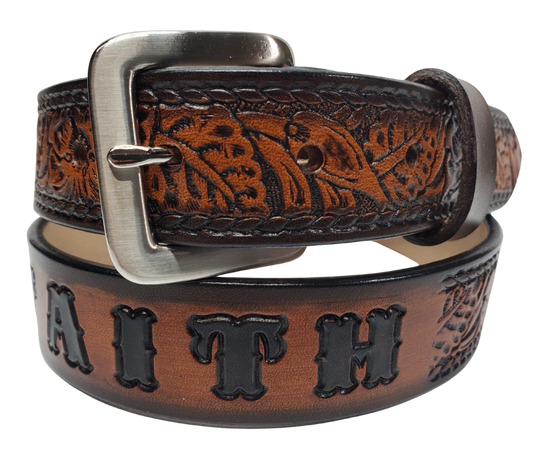 Our Lil Ranch is just like the Ranch for dad or mom. Full grain American vegetable tanned cowhide approx. 1/8"thick. Width is 1 1/4" and includes Antique Nickle plated Solid Brass buckle. We Hand Finished with a darker brown edge feathered into a tan center. Edges are smooth burnished painted edges. Made in our Smyrna, TN, USA shop. Buckle snaps in place for easy changing if desired  Choose with or without name, 