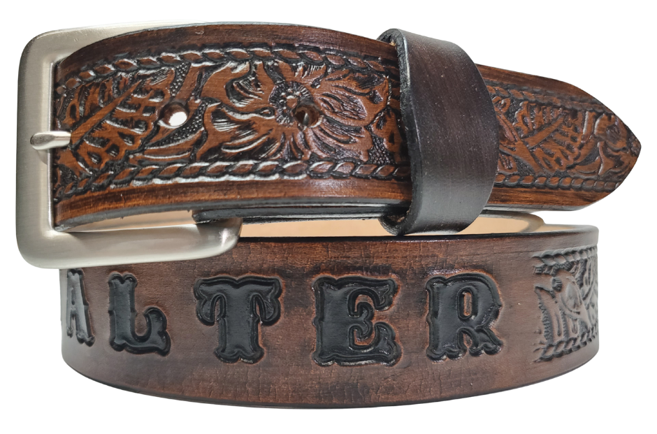 Our Lil Ranch is just like the Ranch for dad or mom. Full grain American vegetable tanned cowhide approx. 1/8"thick. Width is 1 1/4" and includes Antique Nickle plated Solid Brass buckle. We Hand Finished with a darker brown edge feathered into a tan center. Edges are smooth burnished painted edges. Made in our Smyrna, TN, USA shop. Buckle snaps in place for easy changing if desired  Choose with or without name, 