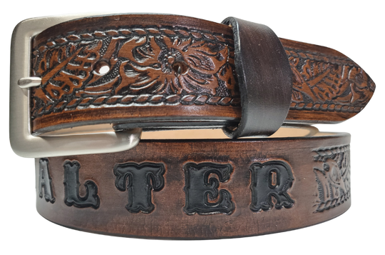 Our Lil Ranch is just like the Ranch for dad or mom. Full grain American vegetable tanned cowhide approx. 1/8"thick. Width is 1 1/4" and includes Antique Nickle plated Solid Brass buckle. We Hand Finished with a darker brown edge feathered into a tan center. Edges are smooth burnished painted edges. Made in our Smyrna, TN, USA shop. Buckle snaps in place for easy changing if desired  Choose with or without name, 