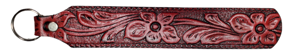 Long Leather embossed Key Fobs that are made in our Smyrna, TN shop. Longer length makes them easier to find in your bag or pocket. Choose popular Designs.

Size is 8"L x 1 1/4" Designs may vary from picture slightly