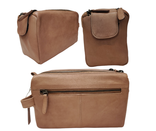 The Representative, a Leather traveling Dopp bag, is available at our Smyrna, TN shop not far from Nashville. It has one outside zip pocket, side handle, and a two-zipper & closure with hook-and-loop securing the end. Spacious main compartment with a zip pocket on one side and three elastic loops on the other side. Lined with a slick fabric.
Bag size: 9.25” x 3.5” x 5.5”