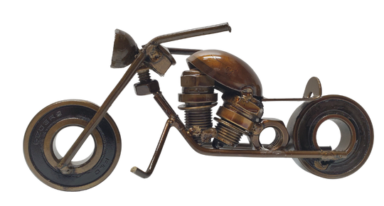 Handmade Recycled Sparkplug Art. Made with Rustic recycled metal and may have visible scratches or imperfections due to their previous use. We strive to minimize these blemishes, but they are a natural result of the recycling process. Stocked at our Smyrna, TN shop close to the Nissan plant.&nbsp;

3" H x 6" L
Made in Mexico