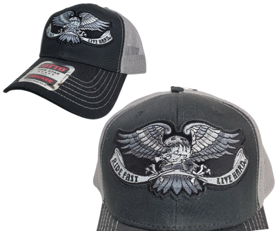 Rev up your life with this Ride Fast Live Hard Trucker Cap! The black twill front and gray mesh back feature contrasting gray and white embroidered bold graphic of an eagle, plus an adjustable strap to perfectly fit any size head. Take a short trip outside Nashville to our Smyrna, TN shop and get yours now! COLOR: BLACK/GRAY