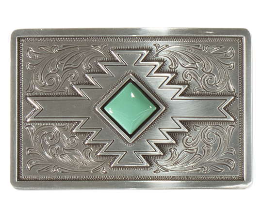 Imagine a beautiful Southwestern landscape with cacti, mountains, and a stunning sunset. Let our "Rio Arroyo" Belt Buckle transport you there with its charming western floral and Navajo-inspired pattern, complete with a vibrant turquoise colored stone at the center. Measuring about 2 1/4" tall by 3 1/4" wide, this buckle fits belts up to 1 1/2" wide and is available for purchase at our retail store in Smyrna, TN, just outside of Nashville.