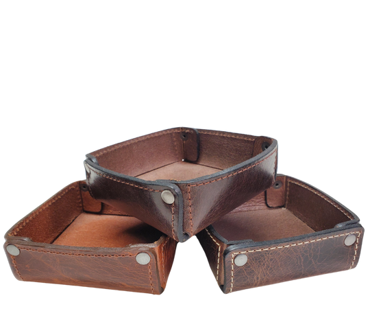 Full 1/8" thick Rectangle Leather Valet tray made in our Smyrna, TN shop. These are our most basic version that we are CLOSING OUT. Very limited stock available. There WILL be some variation from pics in colors. These were Samples and Store Displays. THESE DO NOT COLLASPE like our other valets.