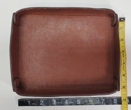 Full 1/8" thick Rectangle Leather Valet tray made in our Smyrna, TN shop. These are our most basic version that we are CLOSING OUT. Very limited stock available. There WILL be some variation from pics in colors. These were Samples and Store Displays. THESE DO NOT COLLASPE like our other valets.