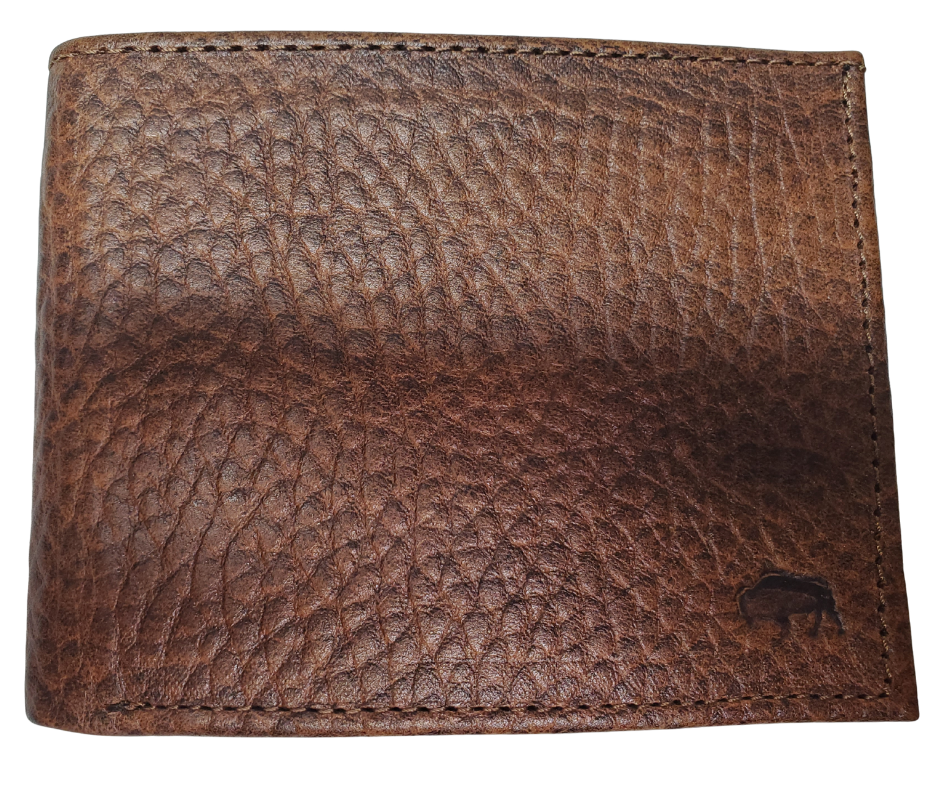 Roper Bison Bi Fold Wallet. Classic design on the inside made from soft durable Bison leather. Featuring 6 card slots, 2 underside pockets, and a single cash slot. In stock at our Smyrna, TN retail store 30 min. from downtown Nashville. Imported.