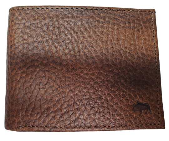 Roper Bison Bi Fold Wallet. Classic design on the inside made from soft durable Bison leather. Featuring 6 card slots, 2 underside pockets, and a single cash slot. In stock at our Smyrna, TN retail store 30 min. from downtown Nashville. Imported.