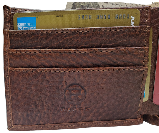 Roper Bison Bi Fold Wallet. Classic design on the inside made from soft durable Bison leather. Featuring 6 card slots, 2 underside pockets, and a single cash slot. In stock at our Smyrna, TN retail store 30 min. from downtown Nashville. Imported.