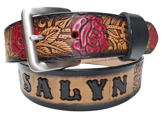 The Rose Bud Leather Name belt with a detailed Timeless Rose Vine pattern. This is the Deluxe version which means it has extra color added to enhance the pattern. Like our other belts it has snaps for easy change of buckles. It's our 9-10 oz veg-tan cowhide that's approx. 1/8" thick. It's embossed and hand stained and fitted with our standard Antique Silver over Solid brass buckle. These are made and shipped weekly only in our Smyrna, TN shop not far from Opry Mills Mall.