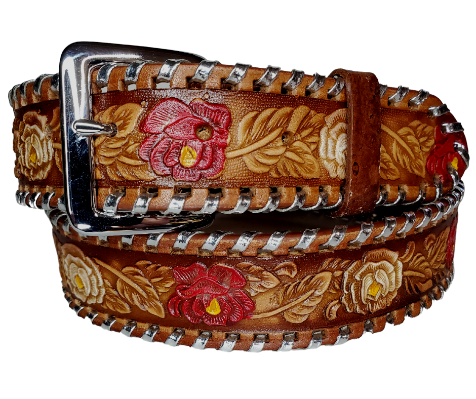 The Roses and Lace leather belt is a classic Vintage Throwback Style Western belt. Complete with silver Buck Lacing around the edge, embossed Red and White Roses design on a brown background. Full grain vegetable tanned cowhide, Includes Nickle plated buckle. Buckle snaps in place for easy changing if desired. In stock at our Smyrna, TN shop. 