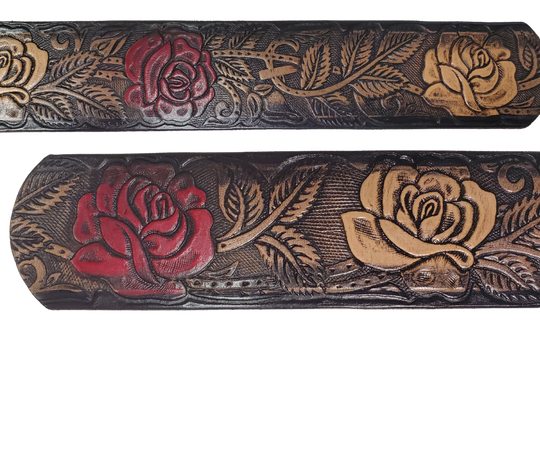 The Rose Bud Leather Name belt with a detailed Timeless Rose Vine pattern. This is the Deluxe version which means it has extra color added to enhance the pattern. Like our other belts it has snaps for easy change of buckles. It's our 9-10 oz veg-tan cowhide that's approx. 1/8" thick. It's embossed and hand stained and fitted with our standard Antique Silver over Solid brass buckle. These are made and shipped weekly only in our Smyrna, TN shop not far from Opry Mills Mall.