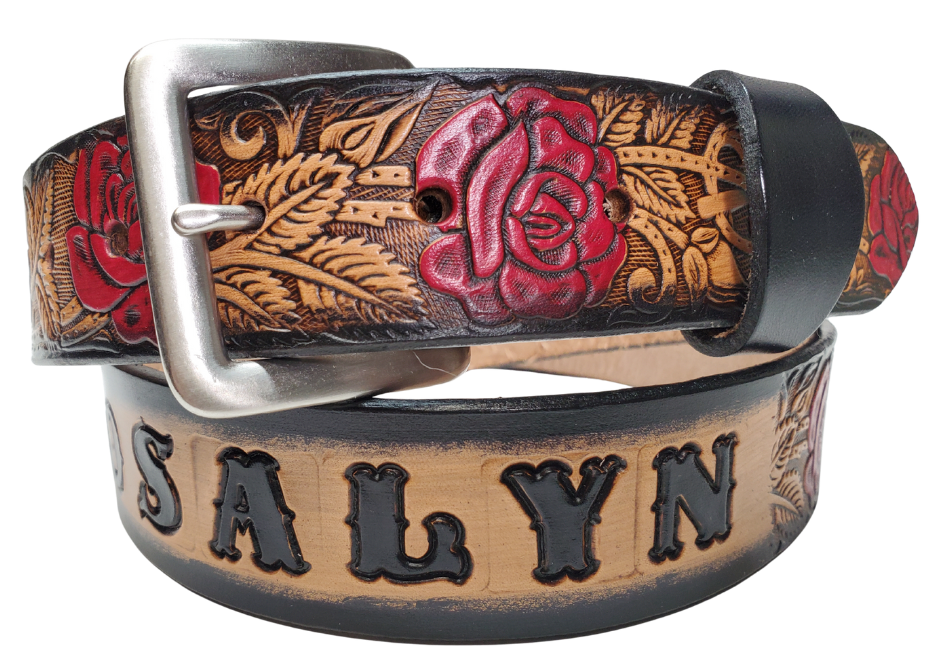 The Deluxe Rose Bud Leather Name belt with a detailed Timeless Rose Vine pattern. It has hand colored Roses with a Natural background with a faded Black border. Like our other belts it has snaps for easy change of buckles. It's our 9-10 oz veg-tan cowhide that's approx. 1/8" thick. It's embossed and hand stained and fitted with our standard Antique Silver over Solid brass buckle. These are made and shipped weekly only in our Smyrna, TN shop not far from Opry Mills Mall.
1 1/2" WIDTH