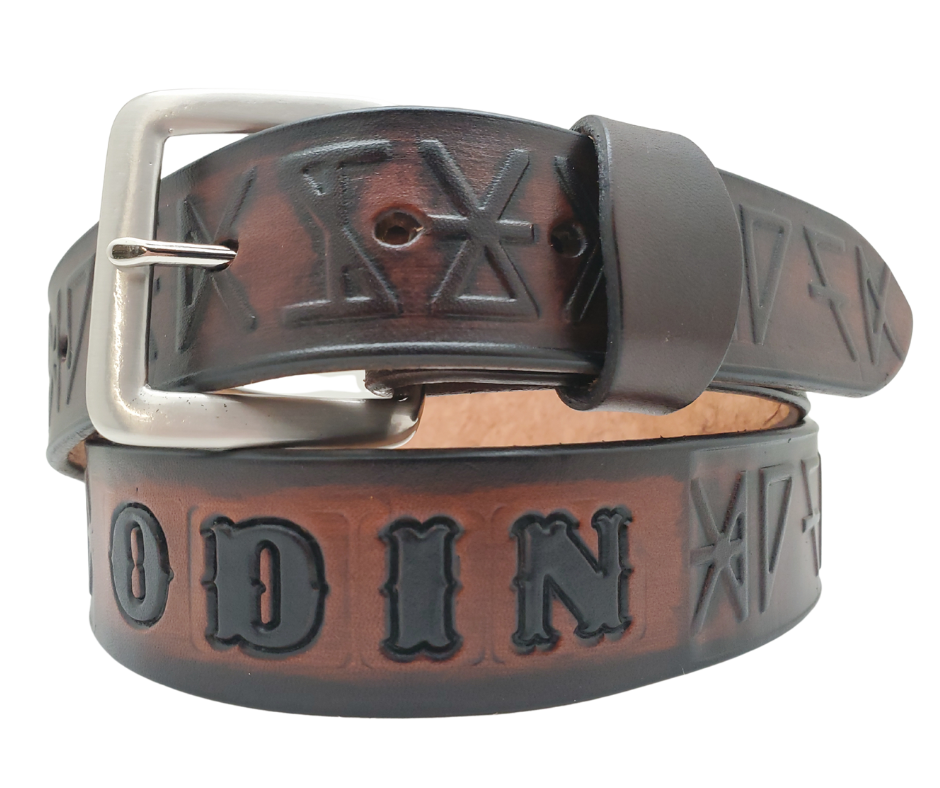 Originating from Germanic tribes, the Rune alphabet was created as a means of recording and communicating information. During the Migration Period, it was heavily influenced by Mediterranean alphabets, specifically Latin. Our 1 1/2" It's all Runes Leather Belt is handcrafted with 9 oz veg-tan leather, carefully stained and embossed, with convenient snaps for easy buckle change. Order online or in-store from our Smyrna, TN shop, just a short distance from Nashville.