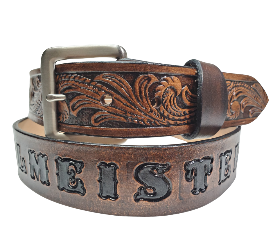 Our Rustler Name Leather Belt is Full grain American vegetable tanned cowhide approx. 1/8"thick. Width 1 1/2" and includes Antique Nickle plated Solid Brass buckle. Hand Finished and Smooth burnished painted edges. Choose with or without name, if without name, design will cover entire length of belt. For name Type name desired on belt in "Type Name Here" section, no more than 10 letters maximum. Buckle snaps in place for easy changing if desired. Made in our Smyrna, TN, USA shop.