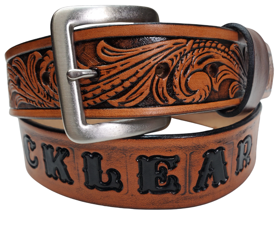Our Rustler Name Leather Belt is Full grain American vegetable tanned cowhide approx. 1/8"thick. Width 1 1/2" and includes Antique Nickle plated Solid Brass buckle. Hand Finished and Smooth burnished painted edges. Choose with or without name, if without name, design will cover entire length of belt. For name Type name desired on belt in "Type Name Here" section, no more than 10 letters maximum. Buckle snaps in place for easy changing if desired. Made in our Smyrna, TN, USA shop.