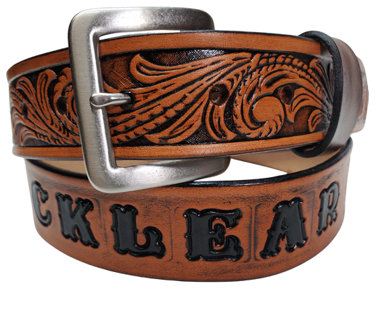 Our Rustler Name Leather Belt is Full grain American vegetable tanned cowhide approx. 1/8"thick. Width 1 1/2" and includes Antique Nickle plated Solid Brass buckle. Hand Finished and Smooth burnished painted edges. Choose with or without name, if without name, design will cover entire length of belt. For name Type name desired on belt in "Type Name Here" section, no more than 10 letters maximum. Buckle snaps in place for easy changing if desired. Made in our Smyrna, TN, USA shop.