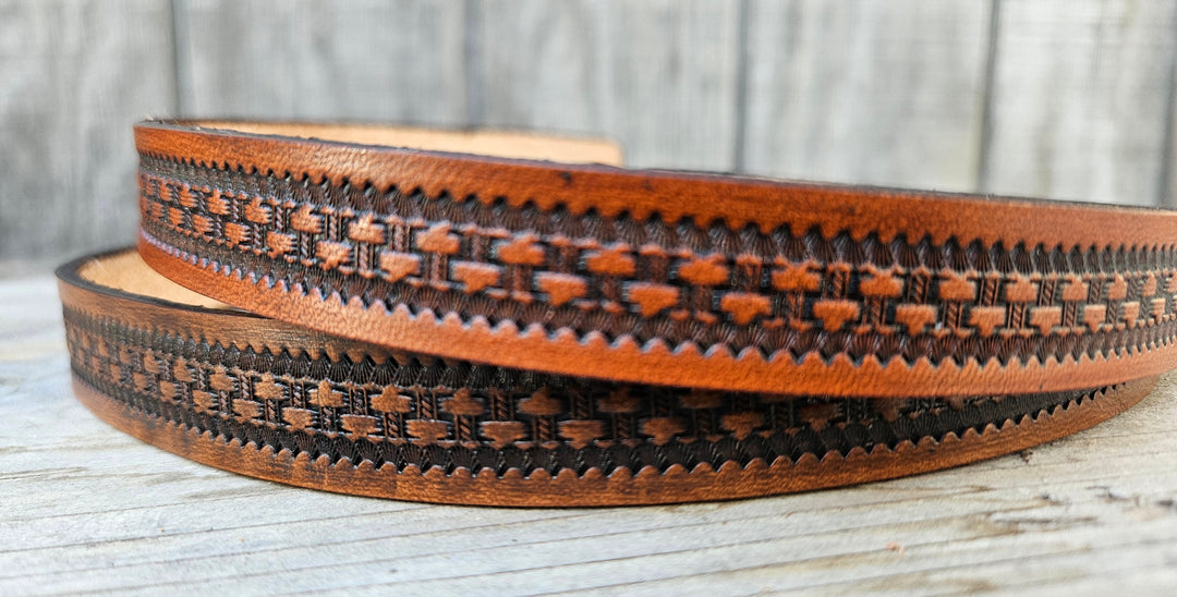 Our Rancho Basket Weave Western Styled Hatband is Hand Stained and is 3/4" in width. It will up to up to size 7 1/2 hat. Fit's most any hat with adjustable bead and leather 1/8" string. Will fit most WESTERN crowned hats. Made in our Smyrna, TN. shop a short drive from downtown Nashville, TN.

3/4" wide
23" long (without tie string)
