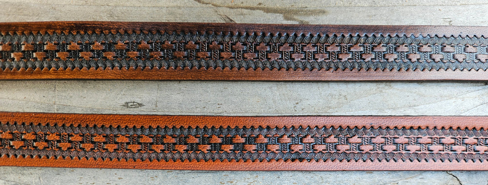 Our Rancho Basket Weave Western Styled Hatband is Hand Stained and is 3/4" in width. It will up to up to size 7 1/2 hat. Fit's most any hat with adjustable bead and leather 1/8" string. Will fit most WESTERN crowned hats. Made in our Smyrna, TN. shop a short drive from downtown Nashville, TN.

3/4" wide
23" long (without tie string)