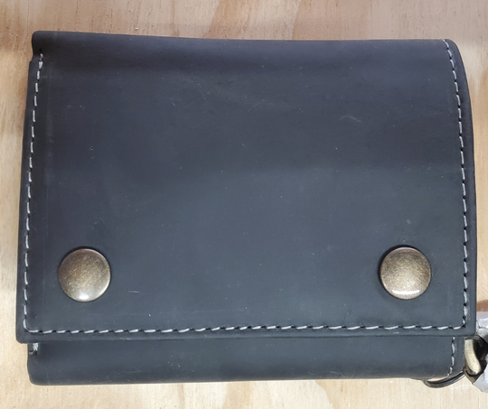 Distressed Black. Popular Distressed brown RFID Secure Tri-fold Chain Wallet. 2 cash slots, 4 card slots, I.D. slot, zippered pocket for all your stash. Will darken with a nice patina with use. It&