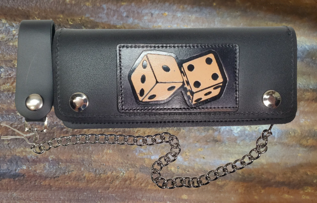 No risk on our Roll the Dice all leather Classic Long Chain Wallet, great for the Modern minimalist. One credit card slot in the front with 2 main cash or whatever your STUFF is....5 year old receipts, concert stub from high school, the stuff you forgot was in there! Available in our Smyrna, TN shop a short drive from downtown Nashville. Like most wallets over stuffing will limit the time of use. Colors may vary from picture.
2 main Cash compartments
Zippered pocket
2 card slots
