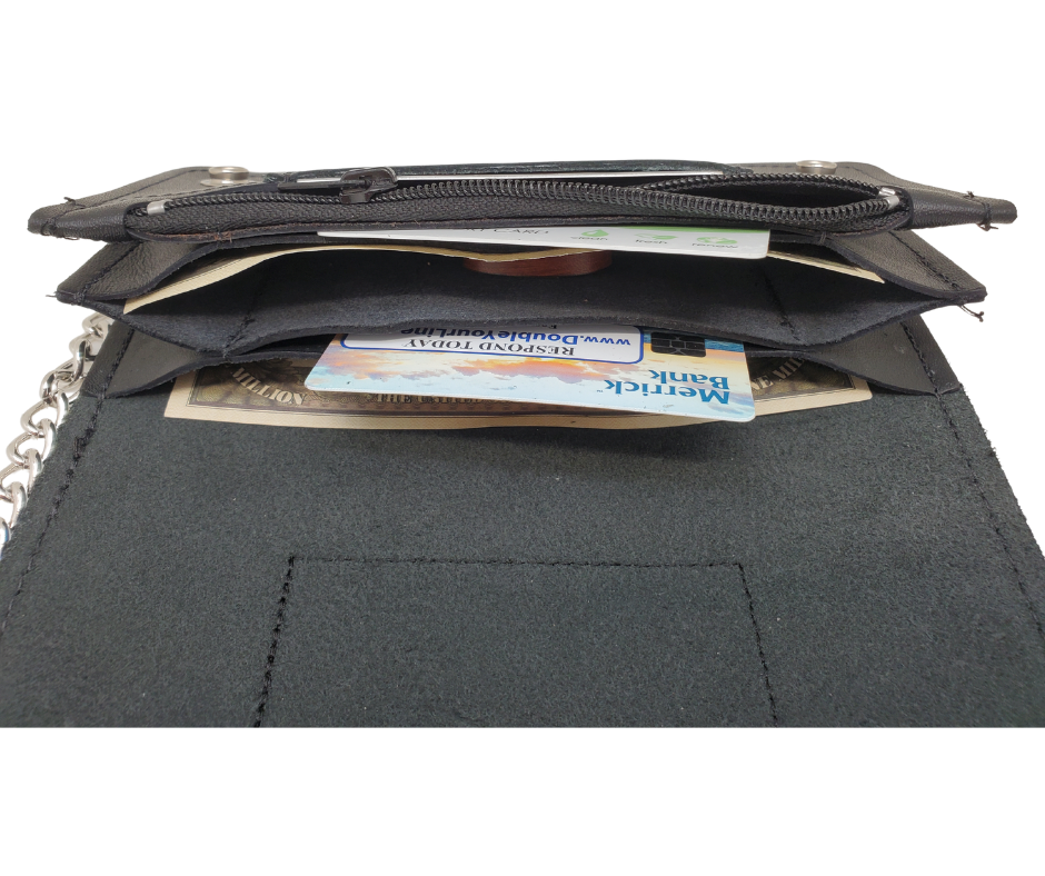 No risk on our Roll the Dice all leather Classic Long Chain Wallet, great for the Modern minimalist. One credit card slot in the front with 2 main cash or whatever your STUFF is....5 year old receipts, concert stub from high school, the stuff you forgot was in there! Available in our Smyrna, TN shop a short drive from downtown Nashville. Like most wallets over stuffing will limit the time of use. Colors may vary from picture.
2 main Cash compartments
Zippered pocket
2 card slots
