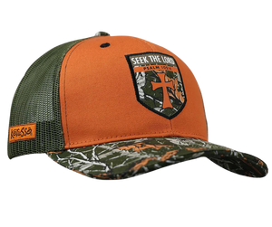Seek out the Lord in this rugged in Camo/Orange. In every circumstance, and in the face of any challenge, seek knowledge, wisdom, and respite in your relationship with God as your first response. Seek yours at our Smyrna,TN shop a short drive from downtown Nashville.  Color: Orange/Camo Cotton Front/Mesh Back Mid-rise One Size Fits Most