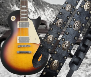 Les Paul's and Billy Gibbon's have been staple for years in Rock music!  "This 2" wide Guitar Strap is a nod to that classic influence. It's made from Pebbled Veg-Tan Cowhide and after some gig's it'll look like you bought in a Vintage shop. The classic adjustment style goes from approx. 42" to 56" at it's longest . Made just outside Nashville in our Smyrna, TN. shop. It will need a bit of time to "break in" but will get a great patina over time.   