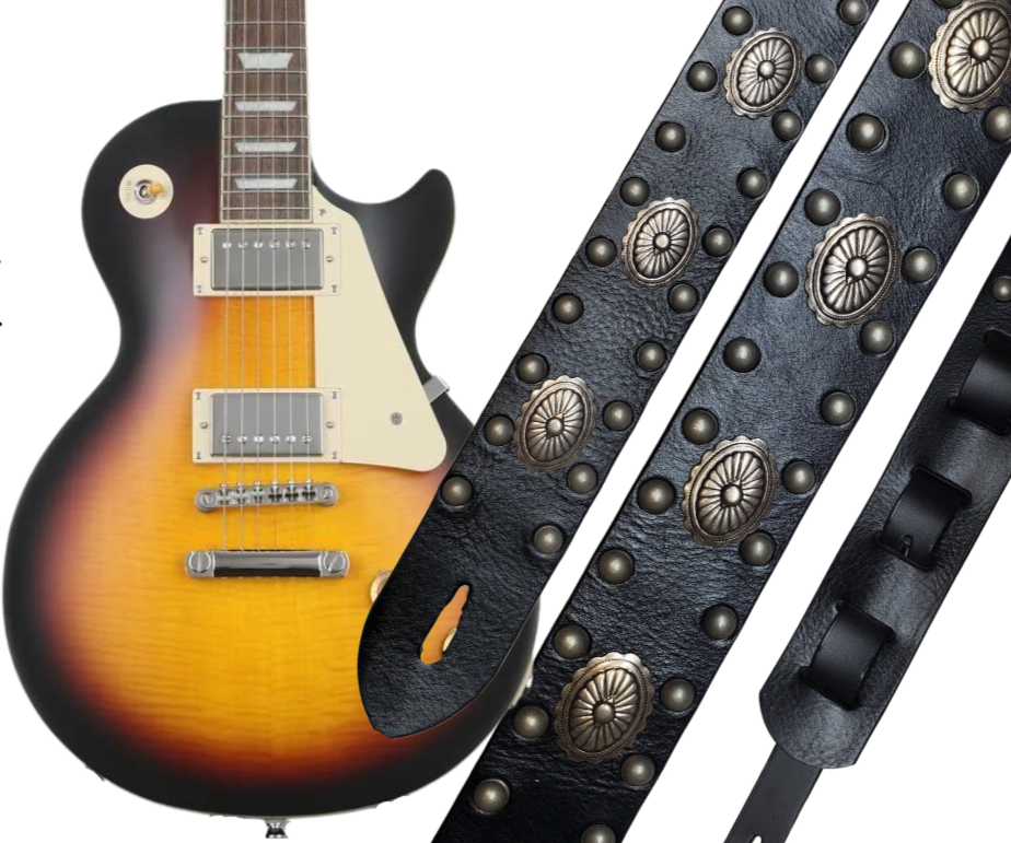 Les Paul's and Billy Gibbon's have been staple for years in Rock music!  "This 2" wide Guitar Strap is a nod to that classic influence. It's made from Pebbled Veg-Tan Cowhide and after some gig's it'll look like you bought in a Vintage shop. The classic adjustment style goes from approx. 42" to 56" at it's longest . Made just outside Nashville in our Smyrna, TN. shop. It will need a bit of time to "break in" but will get a great patina over time.  