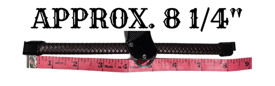 Brown bracelet beside pink measuring tape displaying &
