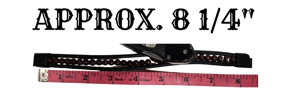 Measurement of bracelet with a ruler showing &