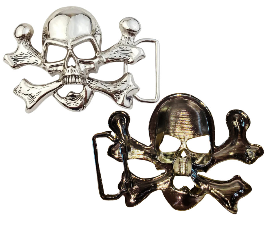 The "Jolly Roger" buckle features the iconic skull and crossbones design. It fits any standard 1 1/2" belt and shines with a polished silver finish. Measuring about 3" by 4", this bold buckle is ready to add some pirate flair. Grab yours online or visit us in Smyrna, TN, near Nashville.