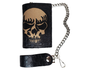 Skulls pattern all leather Tri-fold Chain Wallet. 1 Cash Slot for all your important stash, 3 card slots and 1 underneath the middle slot. It's USA made and Buckle and Hide approved. Approx. 3"x 4" folded. 2 snap closure. Complete with an 12" chrome plated chain including leather belt loop. Available in our Smyrna, TN shop a short drive from downtown Nashville. Like most wallets over stuffing will limit the time of use. Colors may vary from picture. 