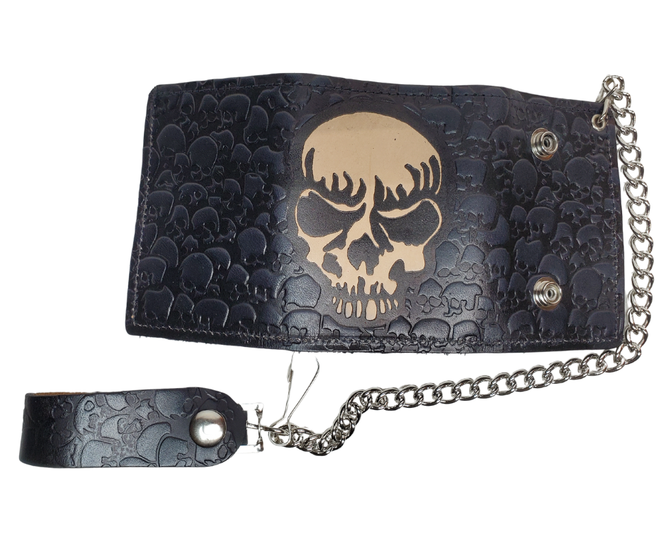 Skulls pattern all leather Tri-fold Chain Wallet. 1 Cash Slot for all your important stash, 3 card slots and 1 underneath the middle slot. It's USA made and Buckle and Hide approved. Approx. 3"x 4" folded. 2 snap closure. Complete with an 12" chrome plated chain including leather belt loop. Available in our Smyrna, TN shop a short drive from downtown Nashville. Like most wallets over stuffing will limit the time of use. Colors may vary from picture. 