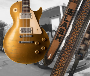 Les Paul's and Slash have been staple for years in Rock music!  "This 2" wide Guitar Strap is a nod to that classic influence. It's made from 1/8" thick Veg-Tan Cowhide and after some gig's it'll look like you bought in a Vintage shop. The classic adjustment style goes from approx. 42" to 56" at it's longest . Made just outside Nashville in our Smyrna, TN. shop. It will need a bit of time to "break in" but will get a great patina over time. 