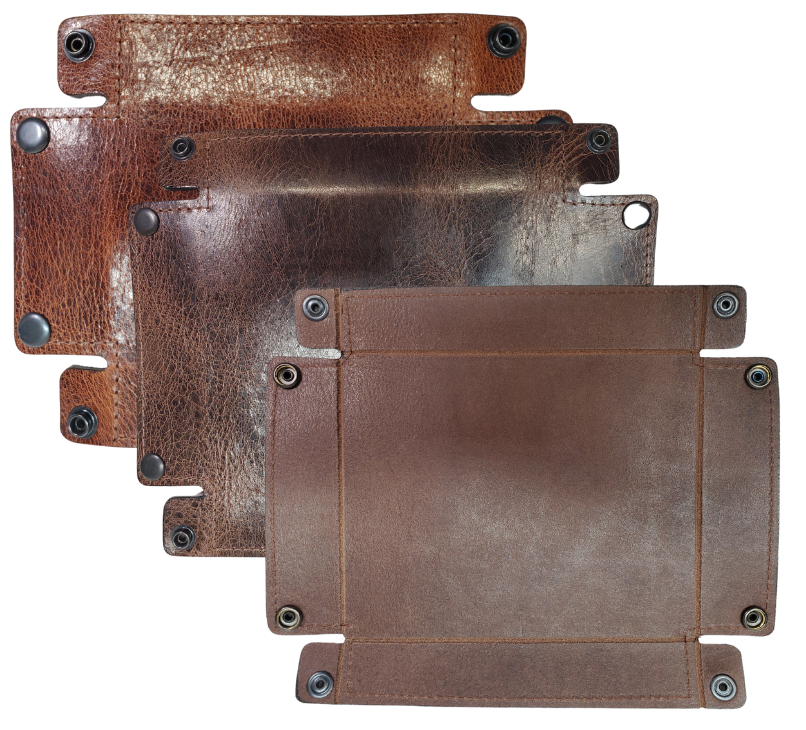 The Capitol Valet Travel Tray is our handmade valet tray is 1 layer of Water Buffalo leather. It's a little different than our other tray because it's more of a Rectangle/Square shape. The corners are held together with heavy line 24 Antique Brass colored snaps, for laying flat for travel, a place for placing keys, wallet, coins, etc. Made in our shop just outside Nashville in Smyrna, TN.

Small is Approx. 4"x 4"
Medium is approx. 4"x6"
Large is approx. 8"x 6"