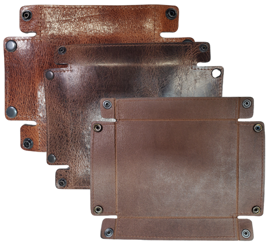 The Capitol Valet Travel Tray is our handmade valet tray is 1 layer of Water Buffalo leather. It's a little different than our other tray because it's more of a Rectangle/Square shape. The corners are held together with heavy line 24 Antique Brass colored snaps, for laying flat for travel, a place for placing keys, wallet, coins, etc. Made in our shop just outside Nashville in Smyrna, TN.

Small is Approx. 4"x 4"
Medium is approx. 4"x6"
Large is approx. 8"x 6"