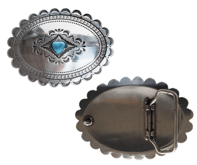A southwest classic style oval Concho design that has a hand stamped appearance. The scalloped edge border sets it off around the edge. It is Antique silver in it's finish with a Small Heart shaped Turquoise colored stone in the center. with scroll design etched appearance on surface.  Measures approx. 3" tall by 4" wide and fits belts up to 1 1/2" wide.  It is available for purchase in our retail shop in Smyrna, TN, just outside Nashville and also on the online store. 