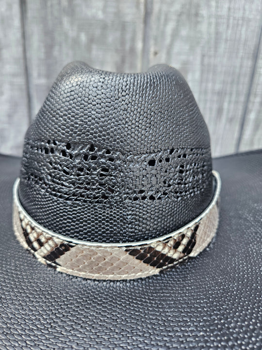 The Headliner Python Snake Skin Hatband is cut to show the back pattern. This band is 1" in width and adjust with a Velcro loop that you can tighten or loose to fit your favorite hats. You can bring your hat and try them out if you come to our Smyrna, TN shop not far from Nashville.

Please keep in mind the patterns will ALWAYS vary since this is a natural skin, these are NOT manufactured skins.
Center Cut is a more defined scale pattern&amp;nbsp;
Side cut has more a mix of colors